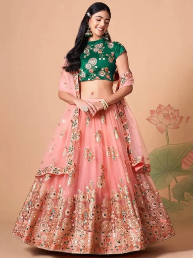 Elegant Peach Mirror Work Net Party Wear Lehenga Choli